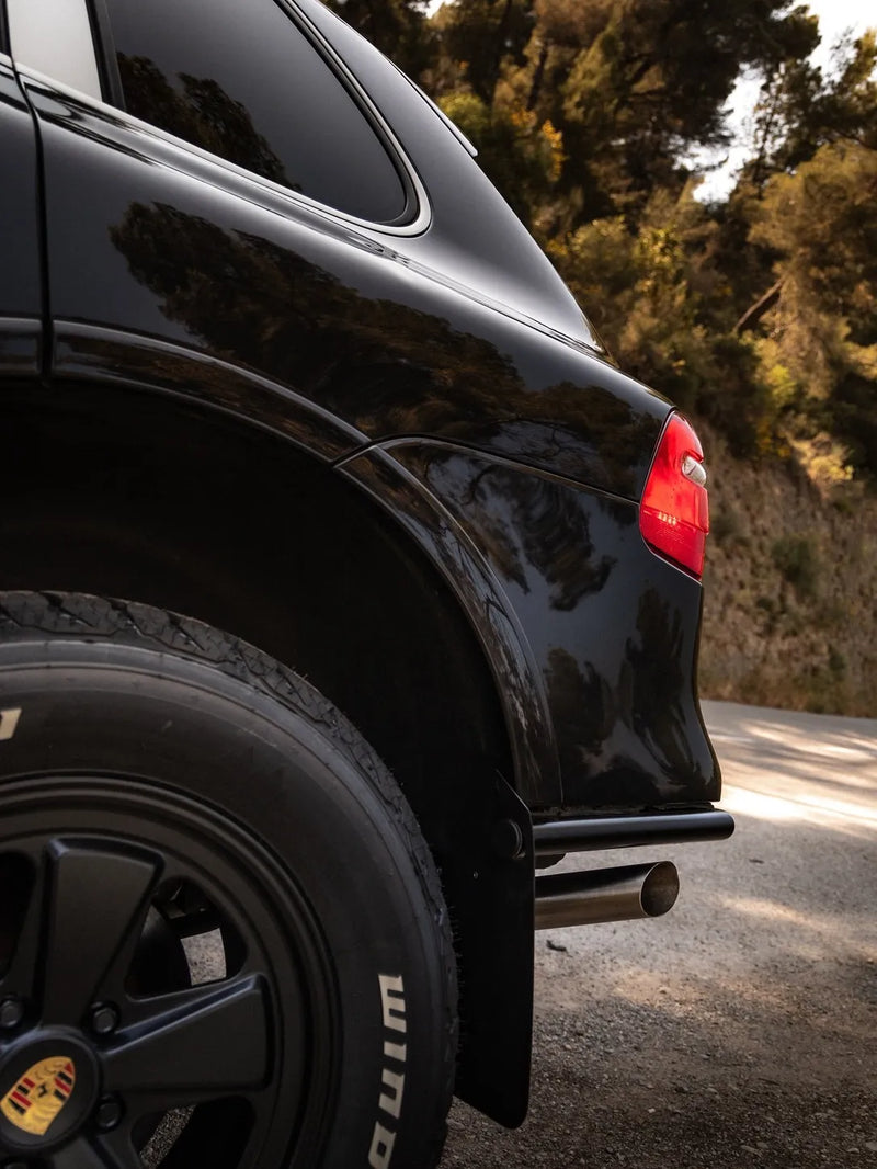 First generation Porsche Cayenne adventure build with matte black Akioverland Classic Fuchs wheels