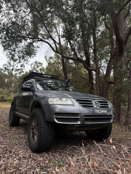 Lifted Touareg 7L driving forest trail overland build Perth Australia