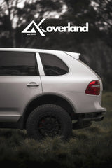 Gen1 Cayenne 957 rear view lifted suspension spring lift kit subframe drop overland build by akioverland