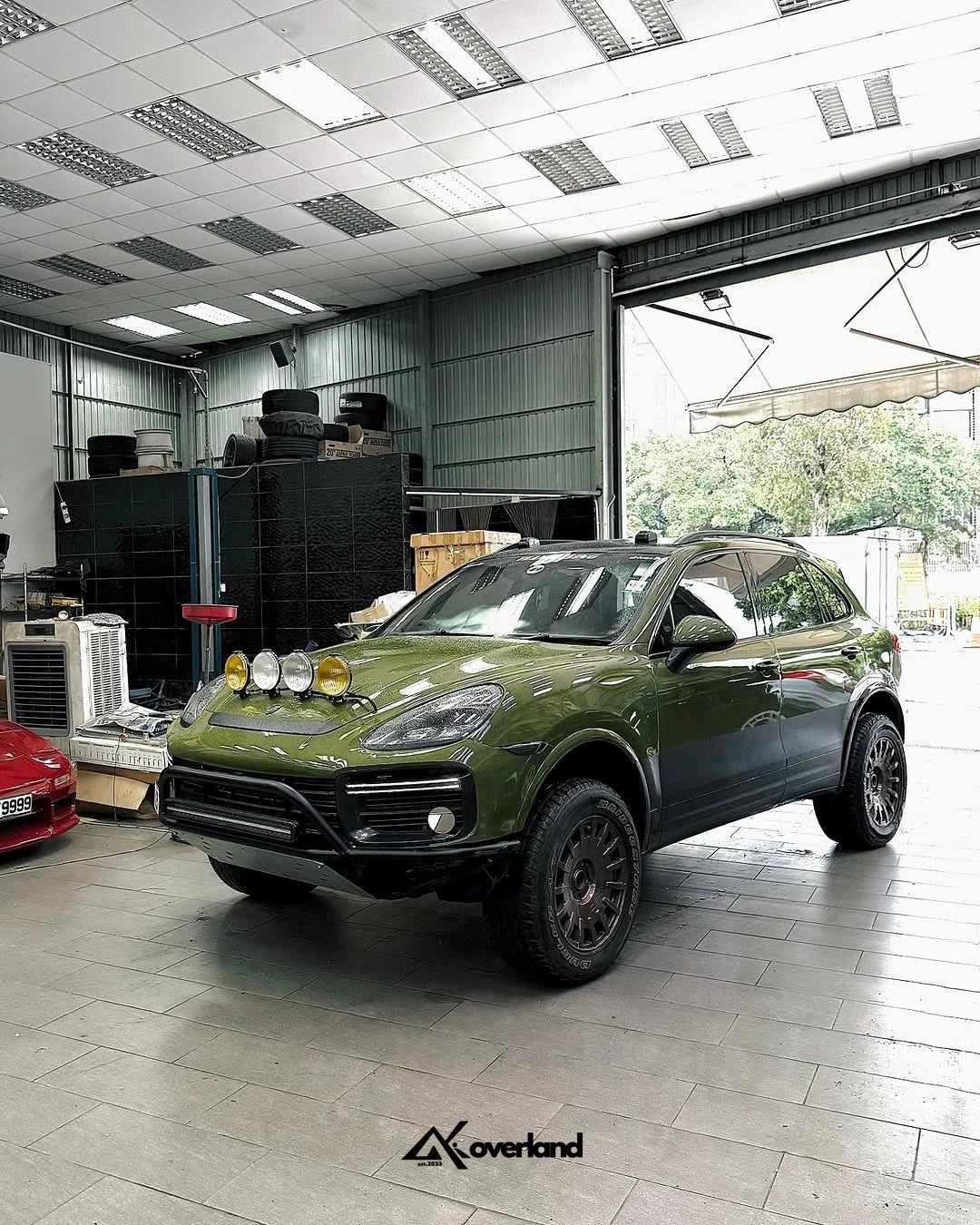 Hong Kong Porsche Cayenne 958 lifted with Akioverland 2.5 inch air lift kit and driveline drop