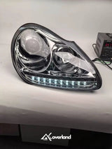Porsche Cayenne 955 LED projector headlight with white daytime running light upgrade.