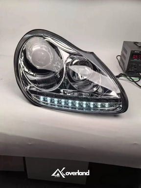 Porsche Cayenne 955 LED projector headlight with white daytime running light upgrade.