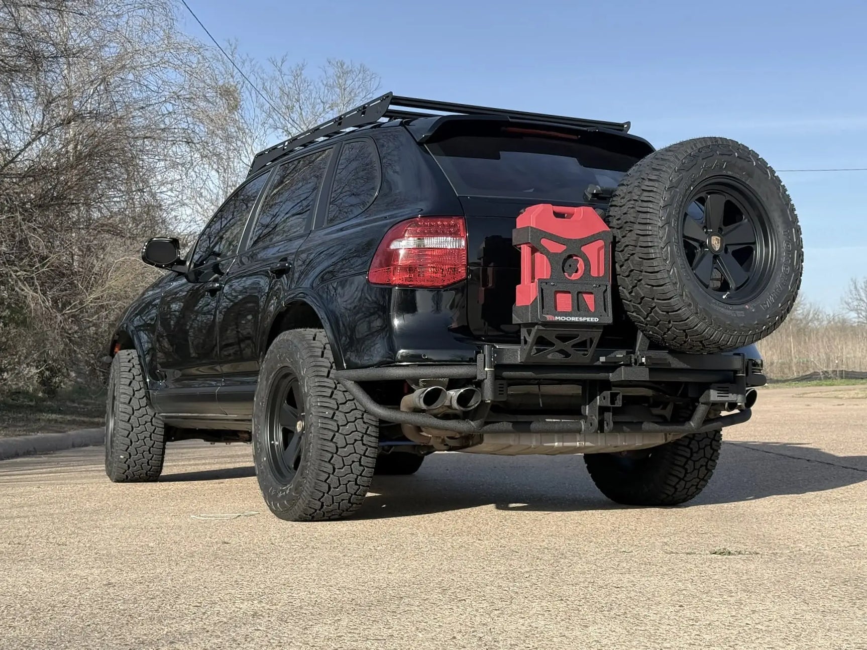 Porsche Cayenne overland build with Akioverland rear tubular bumper and SWA jerry can mounted