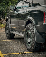 Range rover l322 with 35 inch tires, trispoke wheel and lifted side profile by akioverland. 