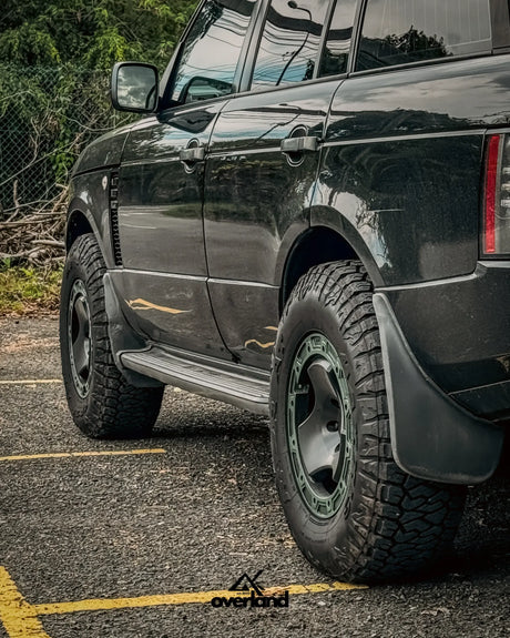 Range rover l322 with 35 inch tires, trispoke wheel and lifted side profile by akioverland. 